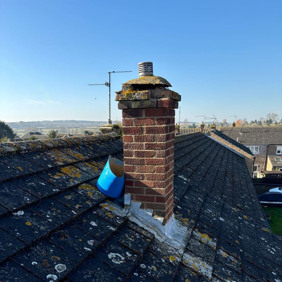 New lead flashing fitted around a chimney