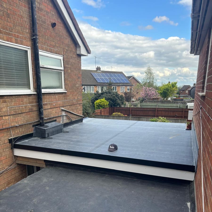 A finished new rubber flat roof on the garage
