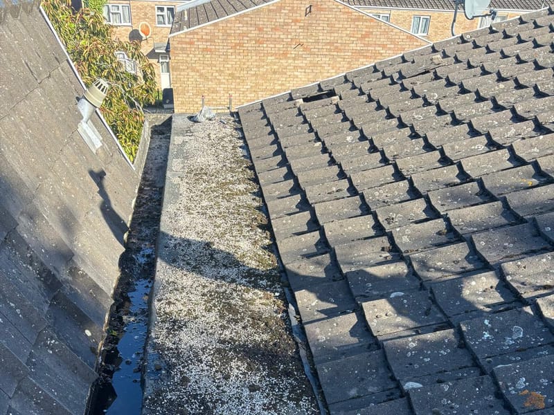 A roof valley cleared and checked