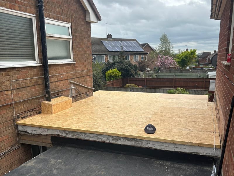 A new timber deck laid on the flat roof